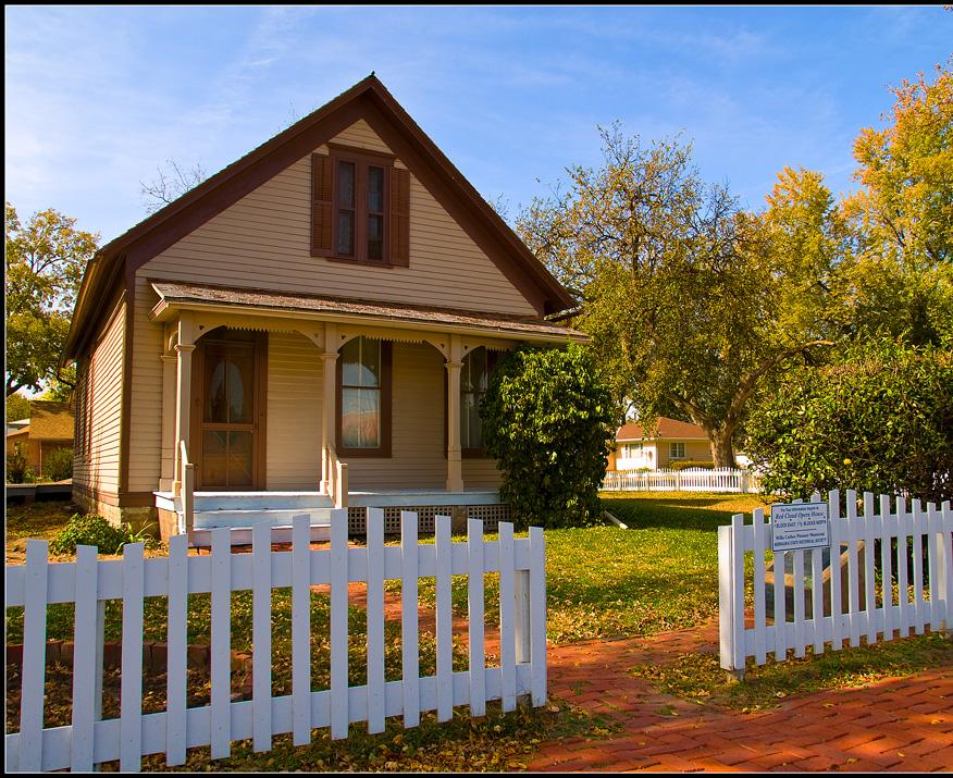 Willa Cather Childhood Home exterior and fence