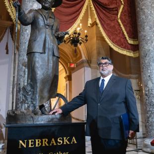 Littleton Alston with his statue of Willa Cather