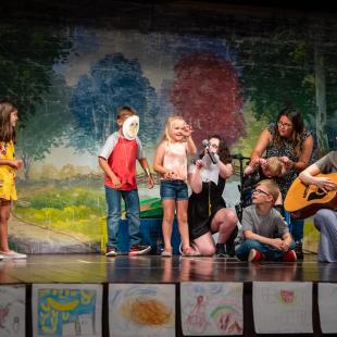 Children on stage for the 2022 Blixt performance.