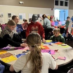 Sixty 4th-6th grade students participate in a 2024 paper-cutting art workshop with artist Linda Rivera Garcia. Sixty 4th-6th grade students participate in a 2024 paper-cutting art workshop with artist Linda Rivera Garcia.