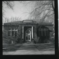 The Auld library's brick entryway, facing Webster Street