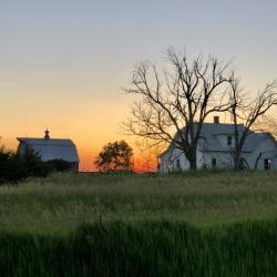 The Pavelka Farmstead at sunset.