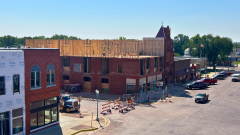 Building materials are added to the top of the Potter Block