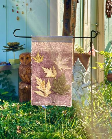 Botanical print flag in a garden
